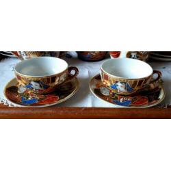 Japans Satsuma dragonware servies met geisha gezichtjes