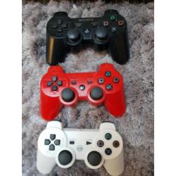 Ps3 + 3 controllers + 8 spellen + toebehoren